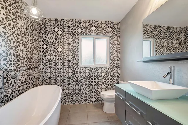 an aerial view of a house with garden space