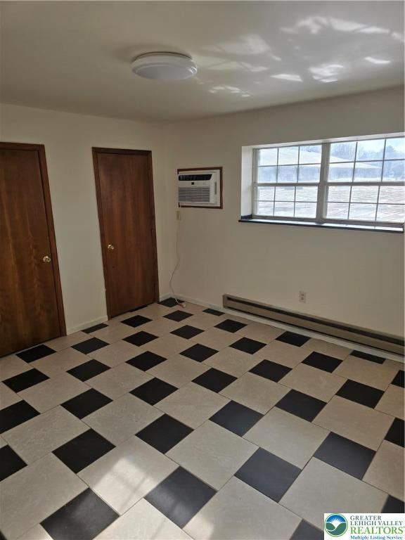 2027 Willow Park Road, Unit 8 Bethlehem, PA 18020 - Photo 11 of 12 a bedroom with a bed and a window