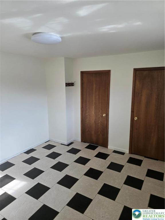 2027 Willow Park Road, Unit 8 Bethlehem, PA 18020 - Photo 12 of 12 a black and white checkered floor