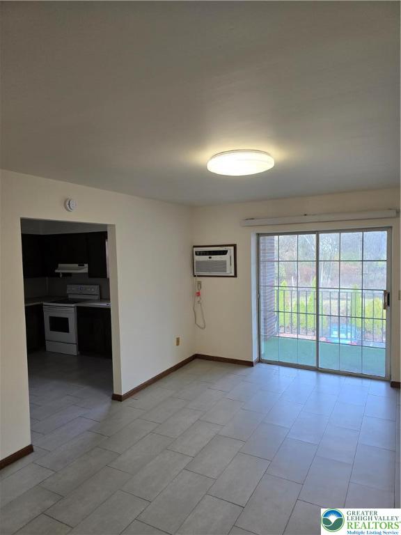 2027 Willow Park Road, Unit 8 Bethlehem, PA 18020 - Photo 3 of 12 an empty room with windows and cabinet