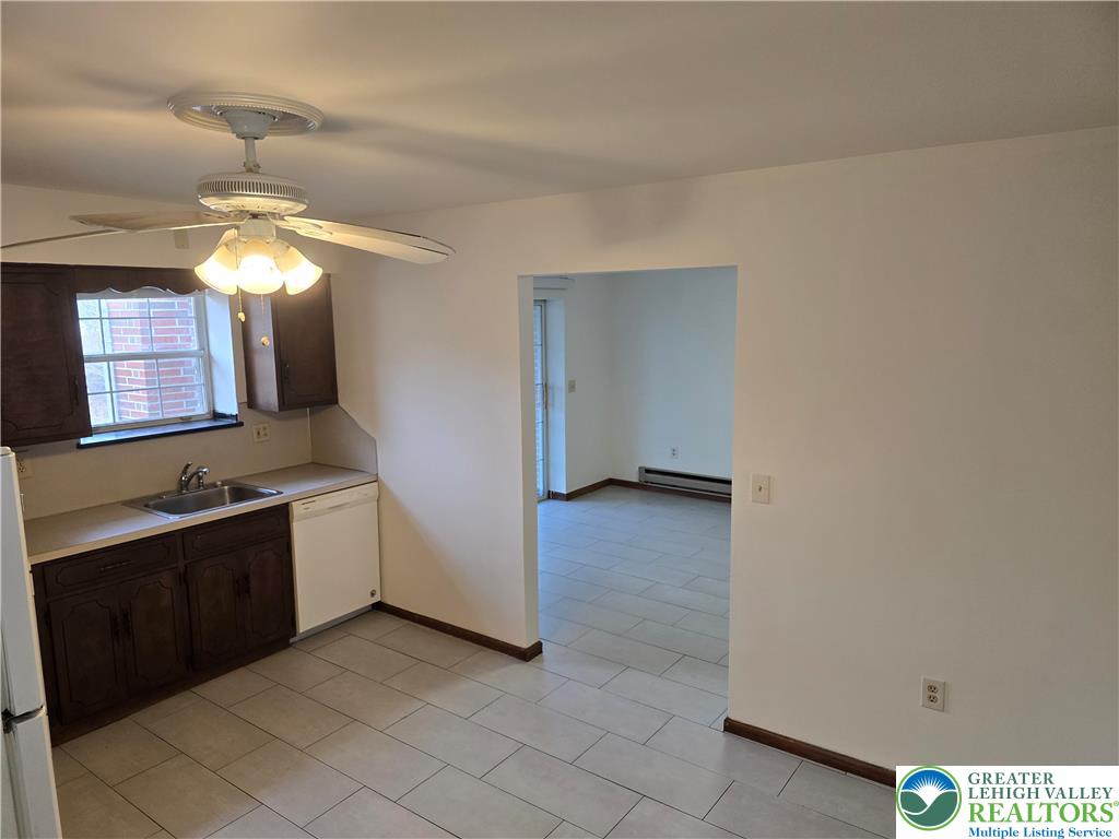 2027 Willow Park Road, Unit 8 Bethlehem, PA 18020 - Photo 5 of 12 a view of a room with a hanging light and kitchen space
