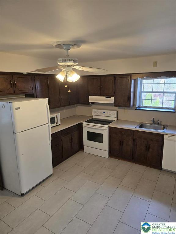 2027 Willow Park Road, Unit 8 Bethlehem, PA 18020 - Photo 6 of 12 a kitchen with a cabinets and white stainless steel appliances