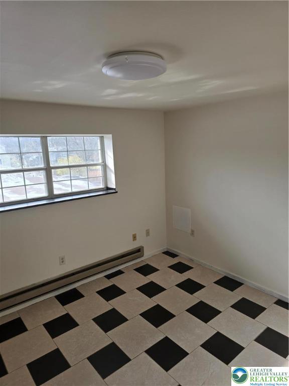 2027 Willow Park Road, Unit 8 Bethlehem, PA 18020 - Photo 10 of 12 a black and white checkered floor
