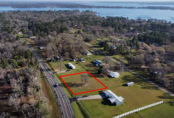 an aerial view of a house with a garden