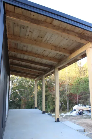 a outdoor space with lots of windows and couch