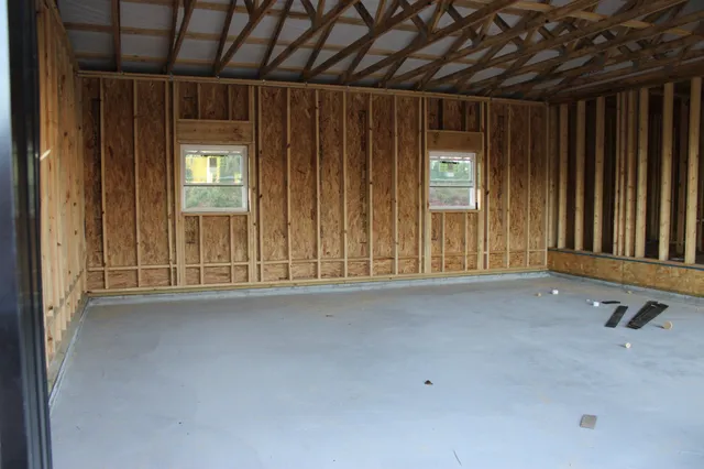 an empty room with windows