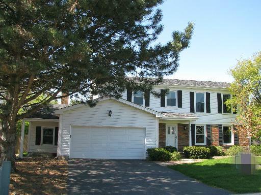 151 South Raddant Road Batavia, IL 60510 - Photo 1 of 16 a front view of a house with a garden