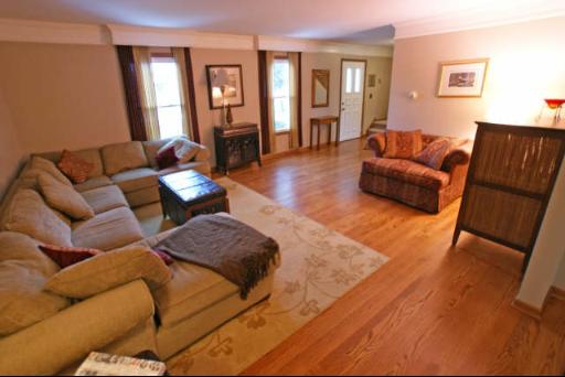151 South Raddant Road Batavia, IL 60510 - Photo 2 of 16 a living room with furniture and a couch