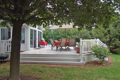 151 South Raddant Road Batavia, IL 60510 - Photo 15 of 16 a view of a chair and tables in the back yard of the house