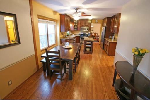 151 South Raddant Road Batavia, IL 60510 - Photo 5 of 16 a view of a dining room with furniture and wooden floor