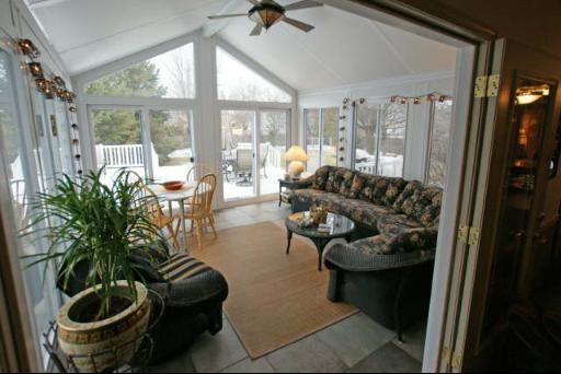 151 South Raddant Road Batavia, IL 60510 - Photo 7 of 16 a living room with furniture and a potted plant