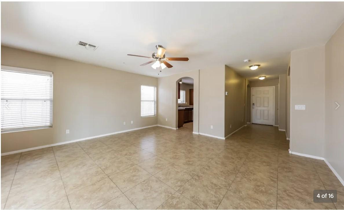 12563 West Charter Oak Road El Mirage, AZ 85335 - Photo 4 of 16 a view of an empty room with a window