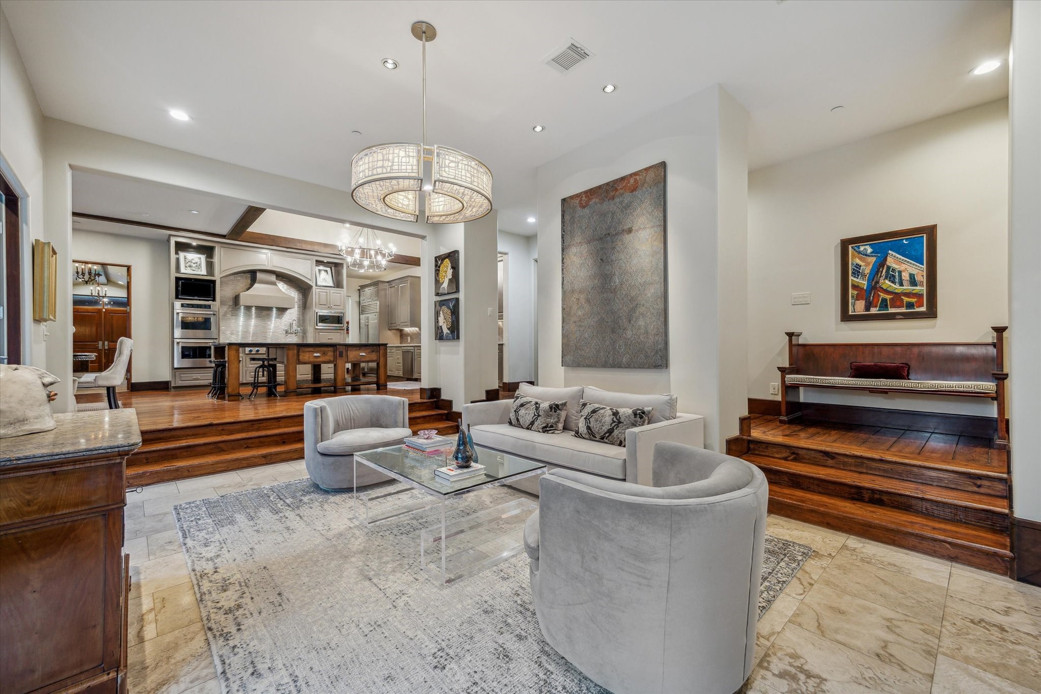 354 Piney Point Road Houston, TX 77024 - Photo 17 of 50 A centrally positioned sunken sitting room creates a seamless, natural flow between rooms, perfect for conversation and relaxation.