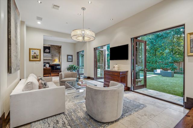 a kitchen with granite countertop cabinets stainless steel appliances and a sink