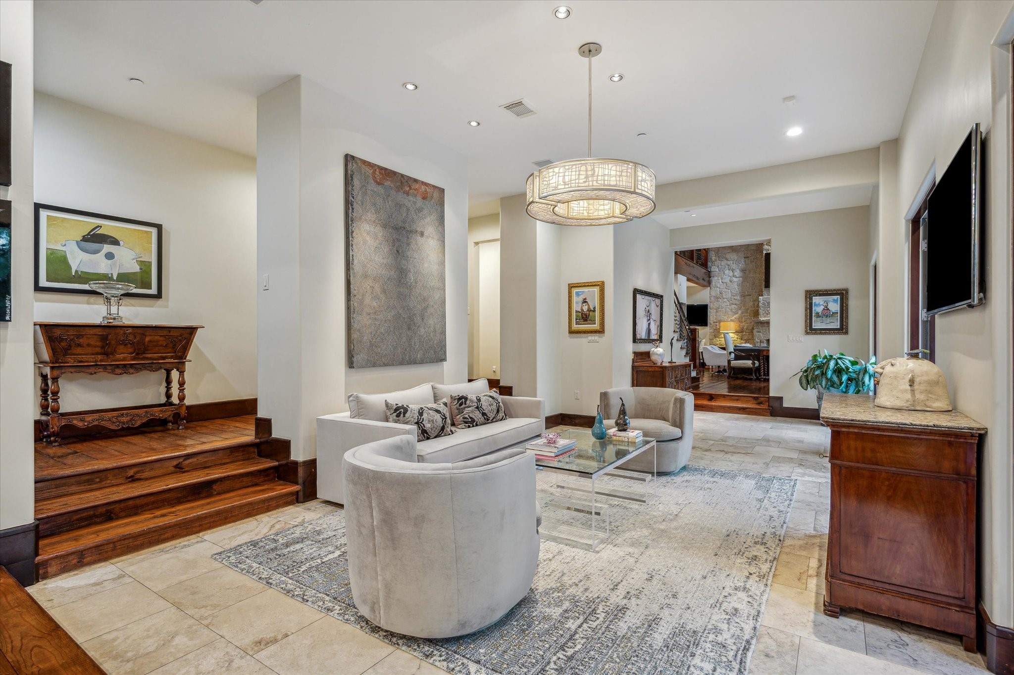 354 Piney Point Road Houston, TX 77024 - Photo 21 of 50 Sunken sitting room, perfect for intimate conversations or lively gatherings.