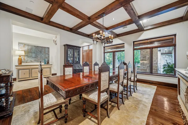 a outdoor dining space with furniture and wooden floor