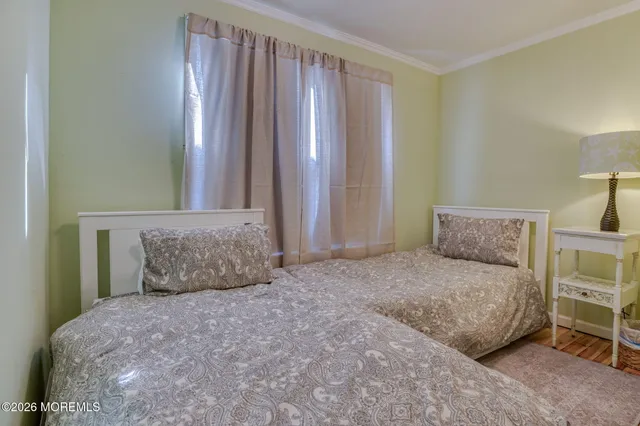 a kitchen with stainless steel appliances a refrigerator and a stove top oven