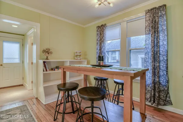 a bedroom with bed and a window