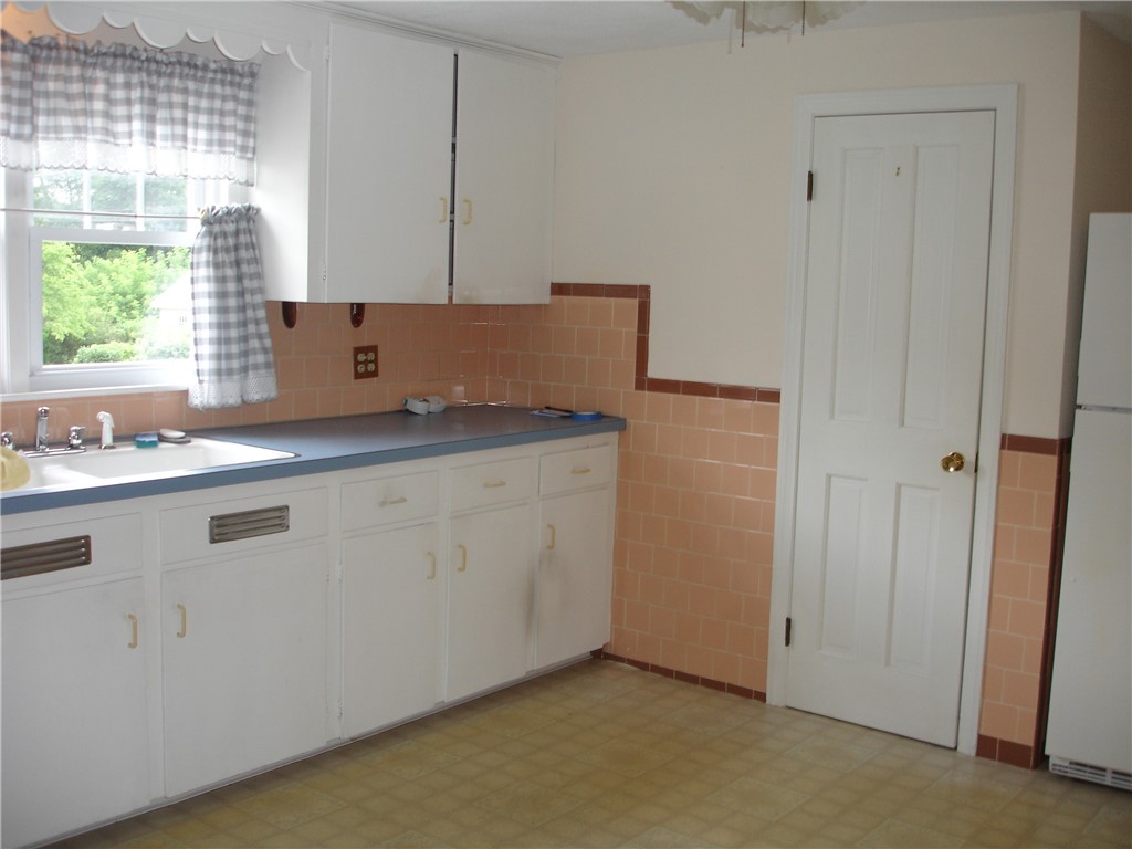68 Bernice Avenue Woonsocket, RI 02895 - Photo 2 of 18 Large well maintained kitchen with formica tops and double bowl sink