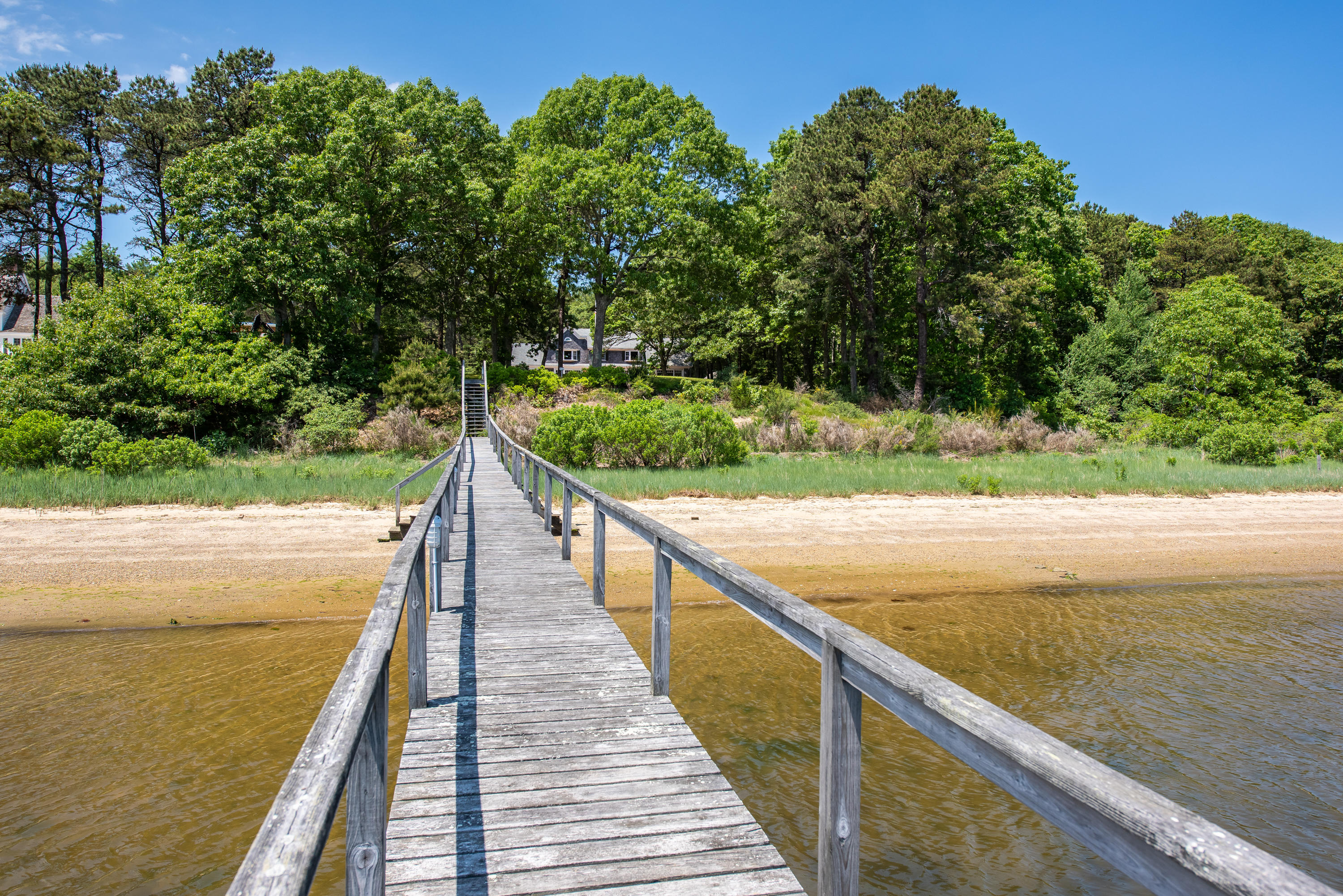 a view of balcony and yard