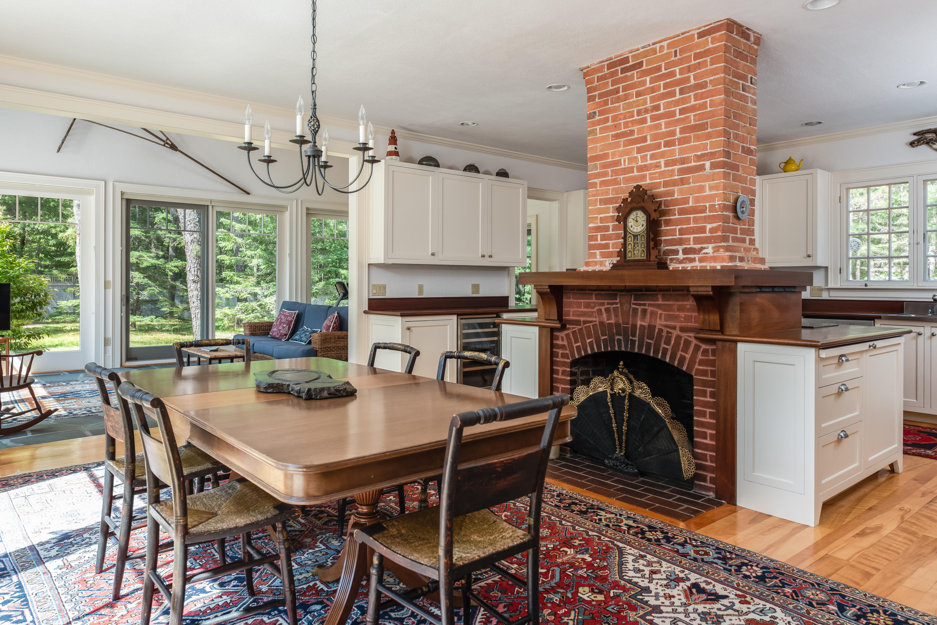 1075 Old Post Road Cotuit, MA 02635 - Photo 11 of 40 a view of a dining room with furniture window and outside view