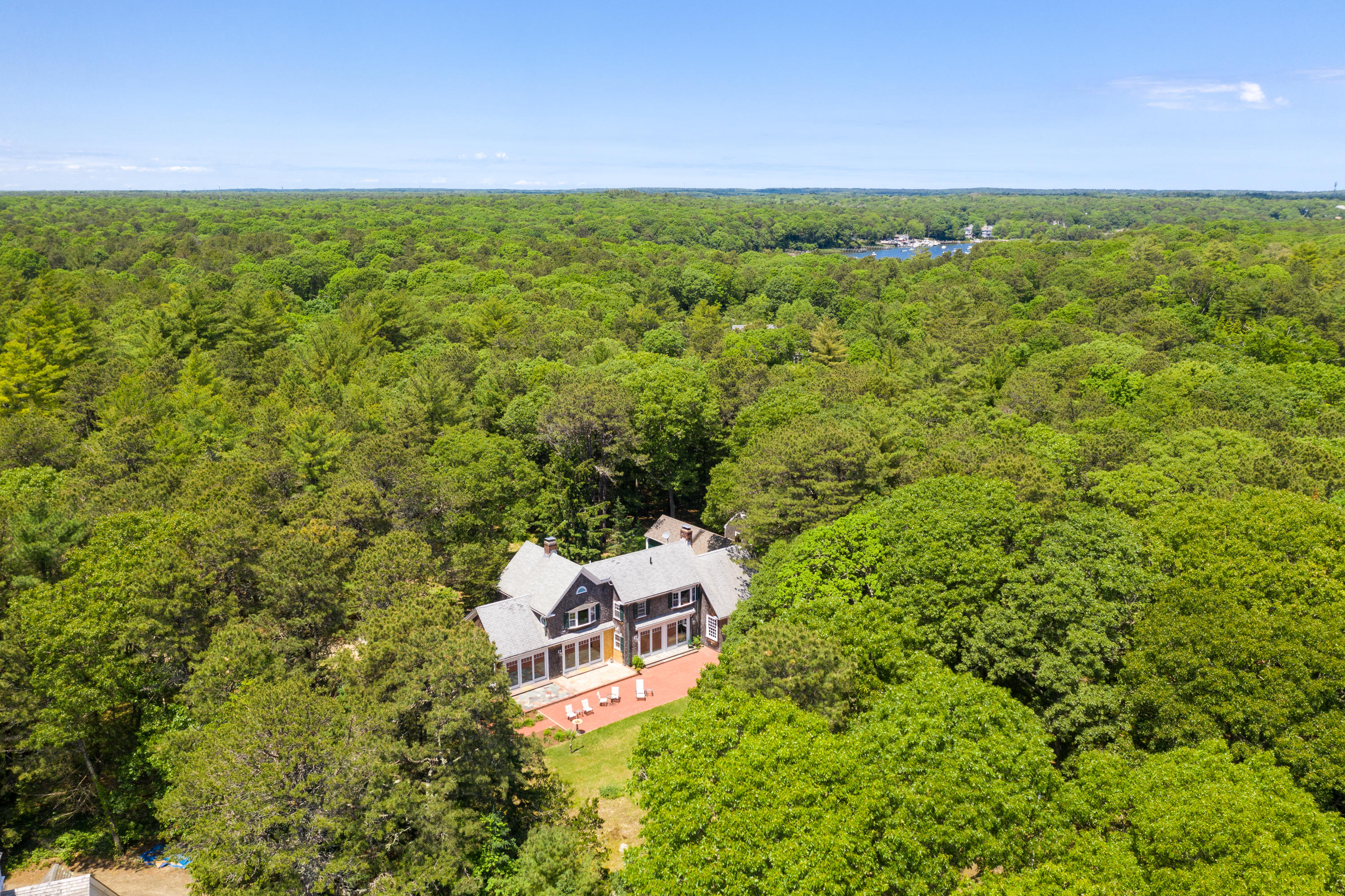 1075 Old Post Road Cotuit, MA 02635 - Photo 39 of 40 a aerial view of a house with a yard