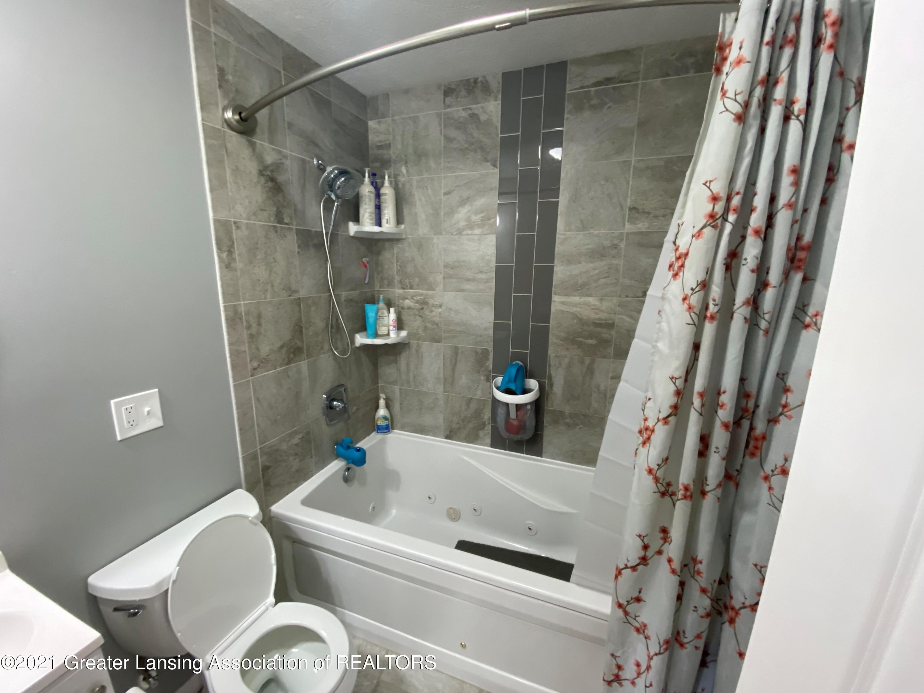 6127 Sleight Road Bath, MI 48808 - Photo 5 of 23 Bathroom