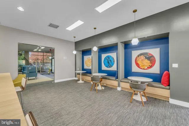 a living room with furniture and rug