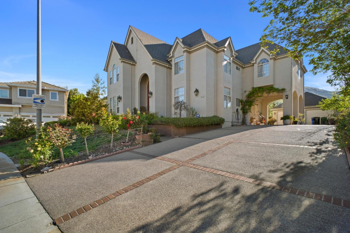 44450 Cavisson Court Fremont, CA 94539 - Photo 2 of 46 a front view of a house with a garden