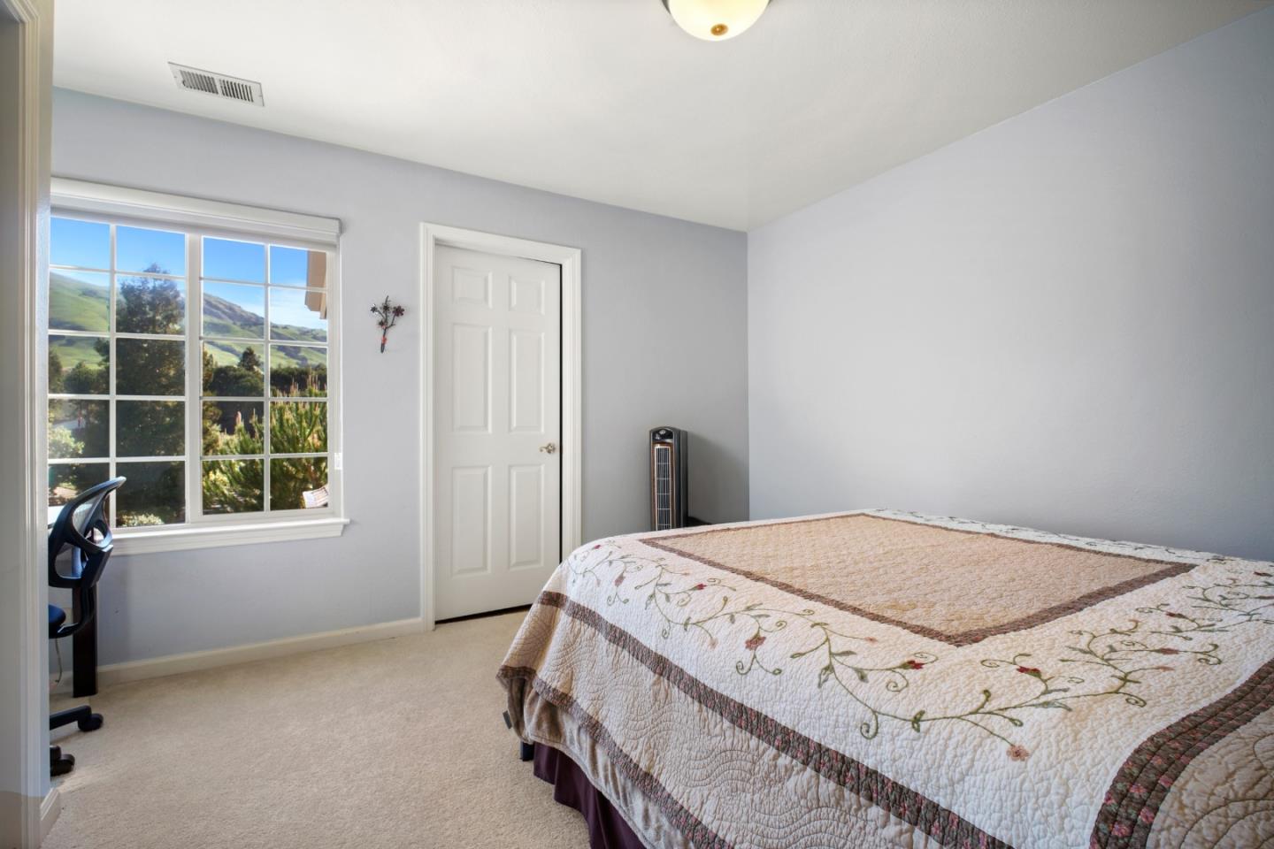 44450 Cavisson Court Fremont, CA 94539 - Photo 30 of 46 a bedroom with a bed and a window