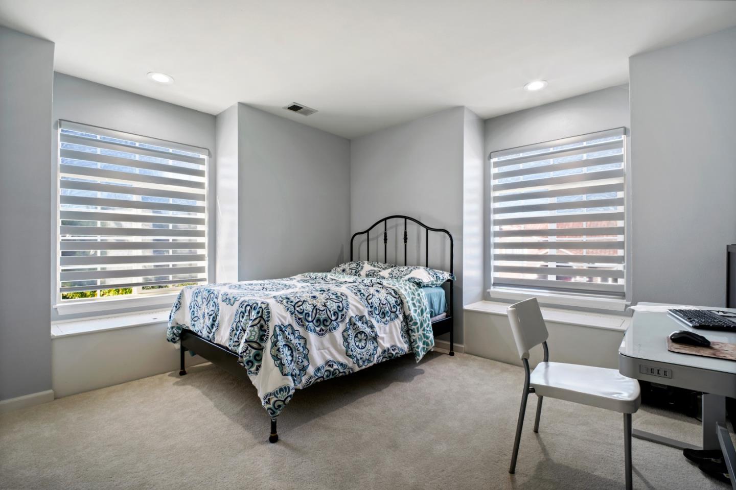 44450 Cavisson Court Fremont, CA 94539 - Photo 33 of 46 a bedroom with a bed chair and a window