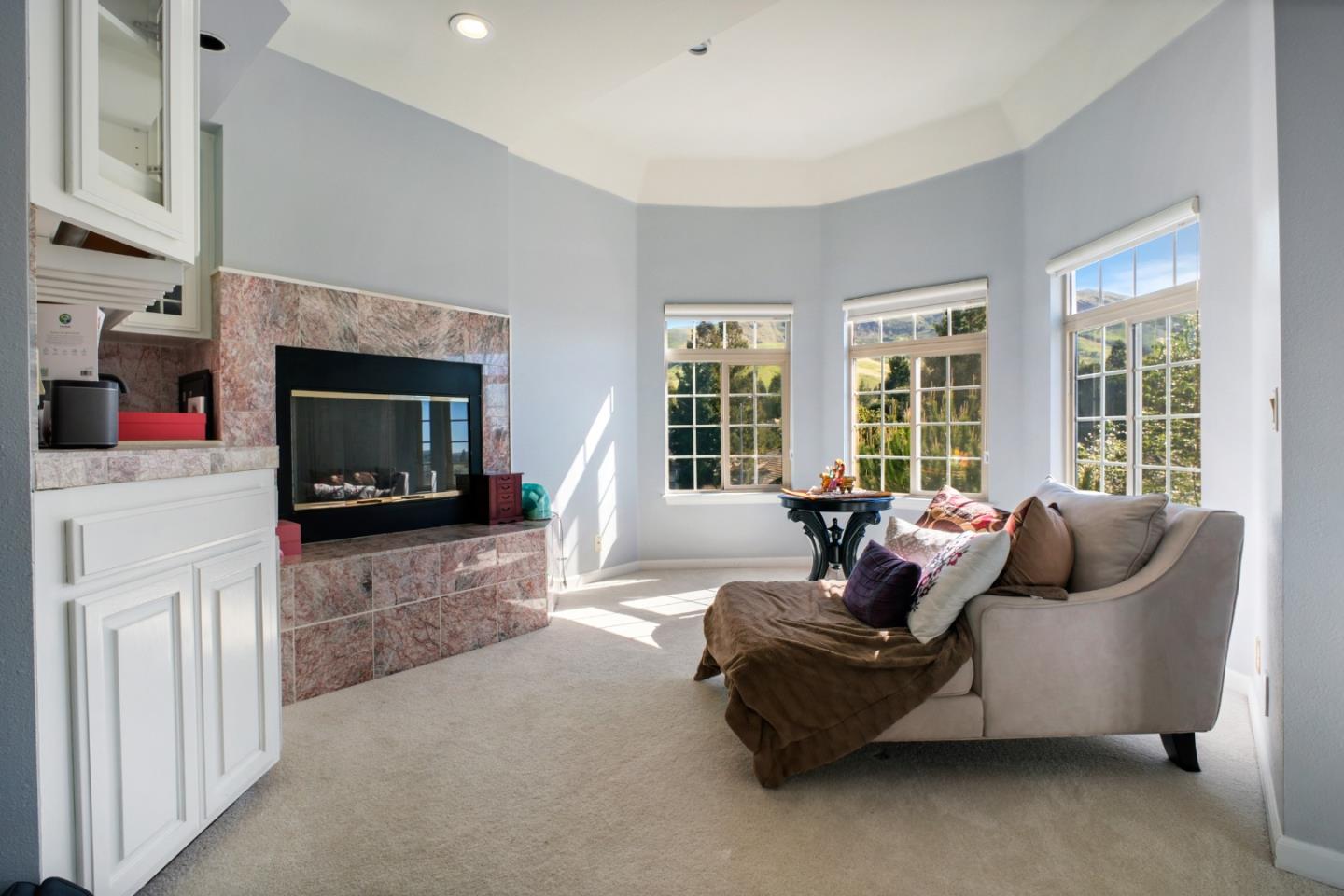 44450 Cavisson Court Fremont, CA 94539 - Photo 38 of 46 a living room with furniture and a fireplace