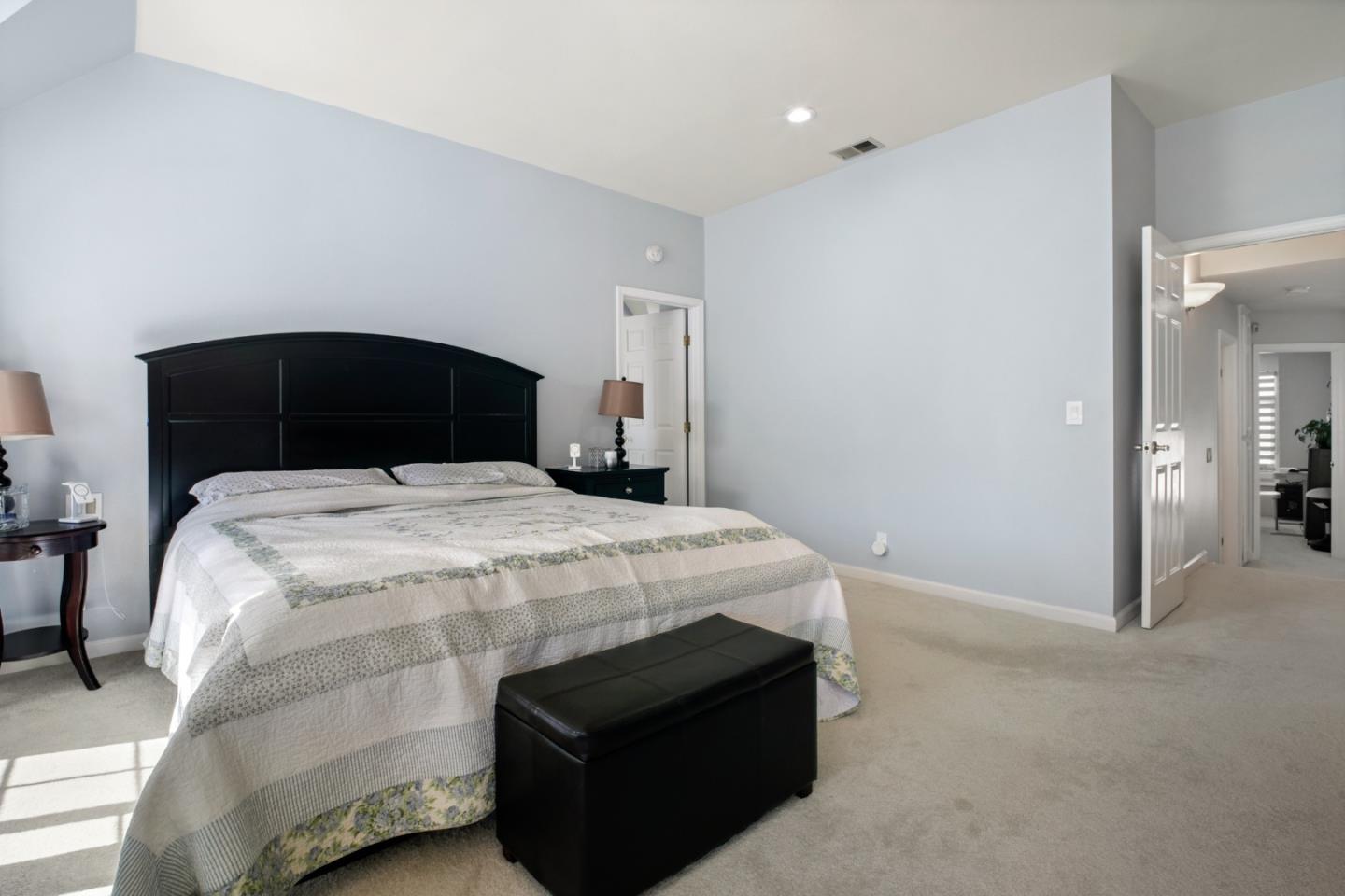 44450 Cavisson Court Fremont, CA 94539 - Photo 39 of 46 a bedroom with a bed and a night stand