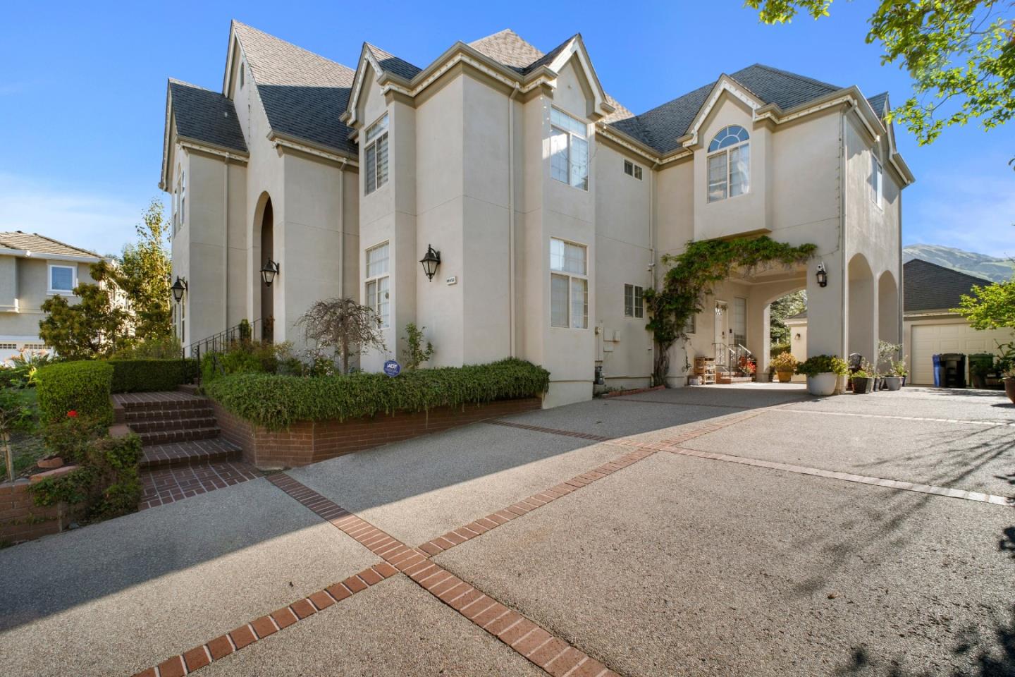 44450 Cavisson Court Fremont, CA 94539 - Photo 6 of 46 a view of a white apartments with large windows