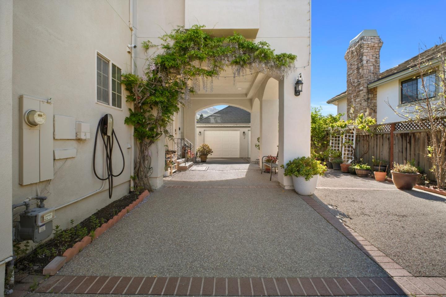44450 Cavisson Court Fremont, CA 94539 - Photo 7 of 46 a building with glass door and outdoor space