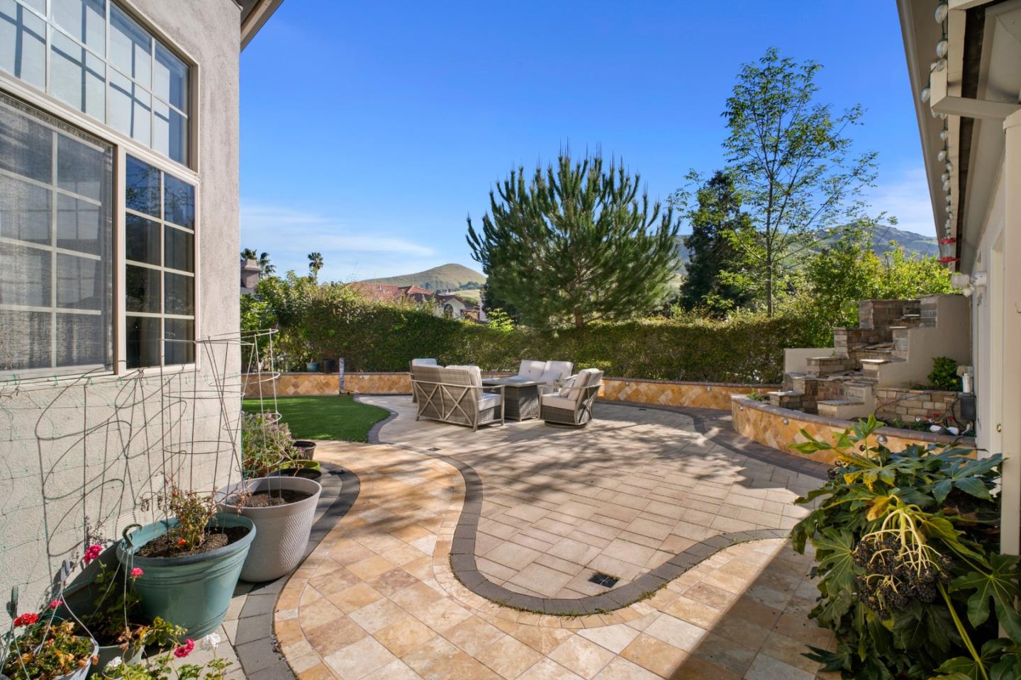 44450 Cavisson Court Fremont, CA 94539 - Photo 8 of 46 a view of a chair and tables in the patio