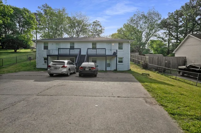 a car parked in front of a house