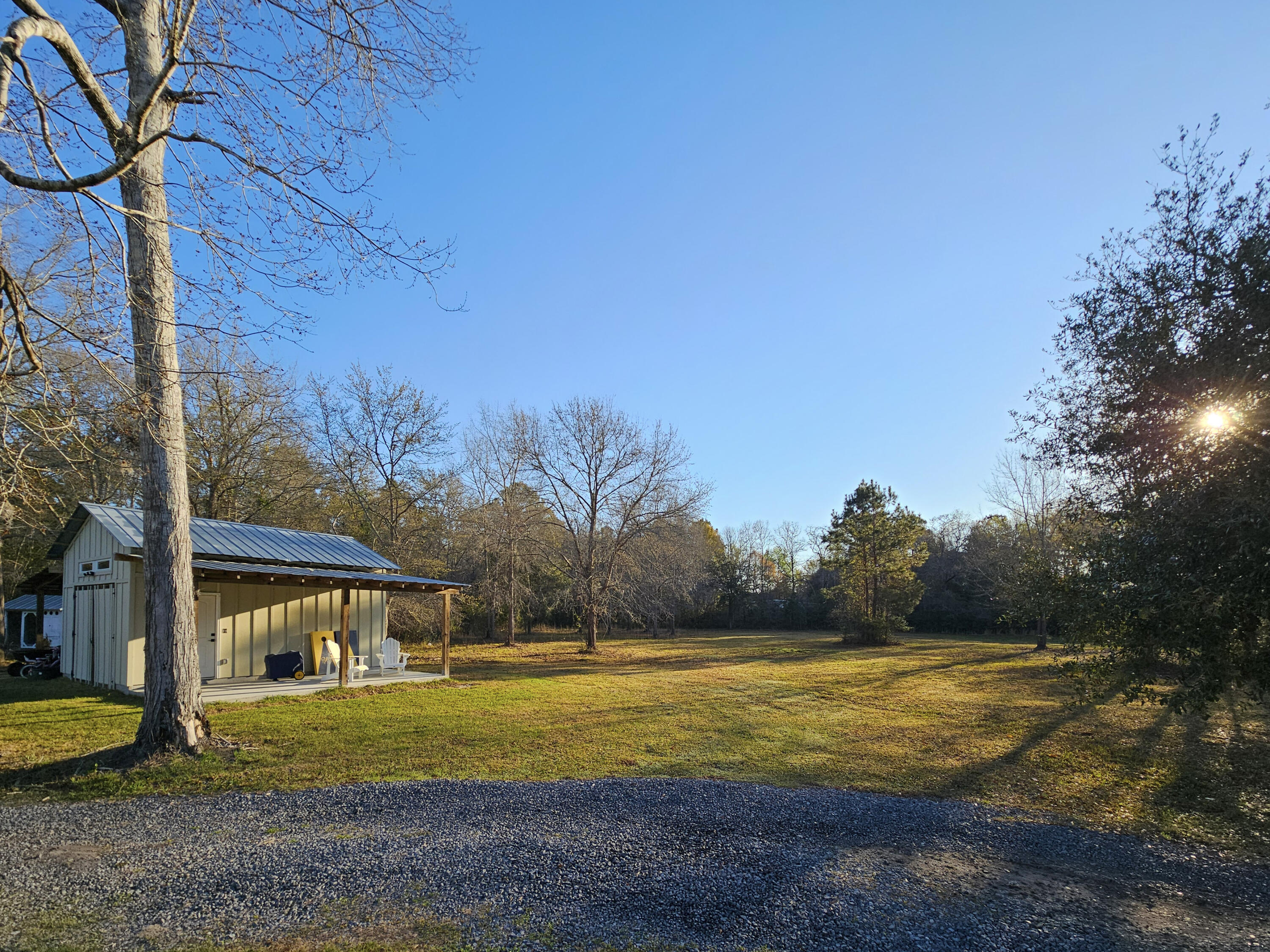 10044 State Rd S-10-1336 McClellanville, SC 29458 - Photo 49 of 53 Barn and field