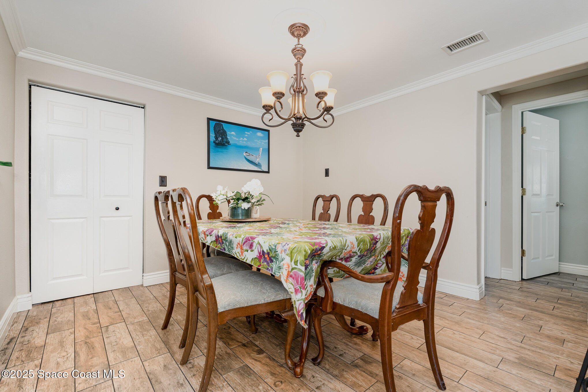1304 Lichty Street Palm Bay, FL 32905 - Photo 12 of 63 a view of a dining room with furniture