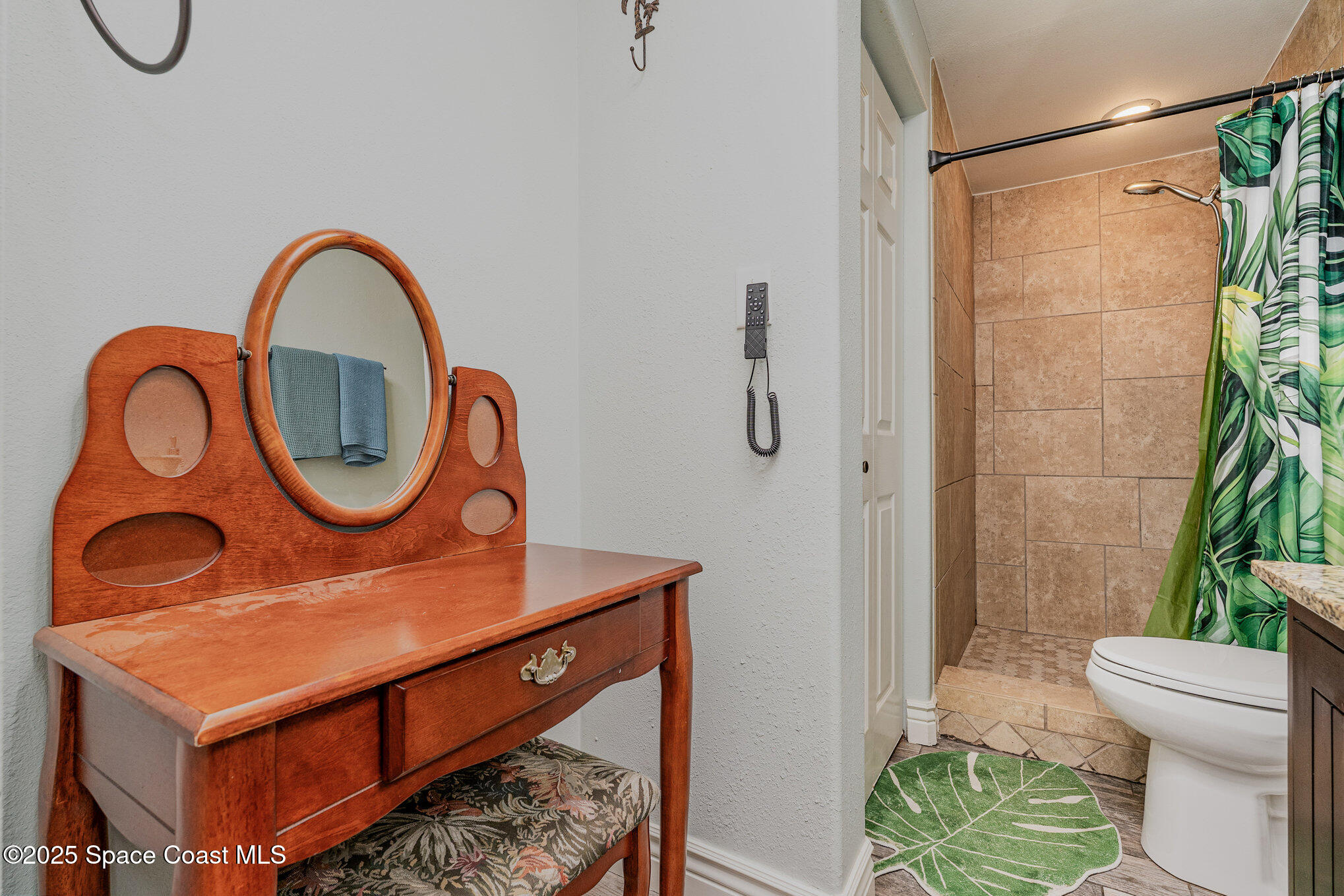 1304 Lichty Street Palm Bay, FL 32905 - Photo 21 of 63 a bathroom with a sink a toilet and a shower