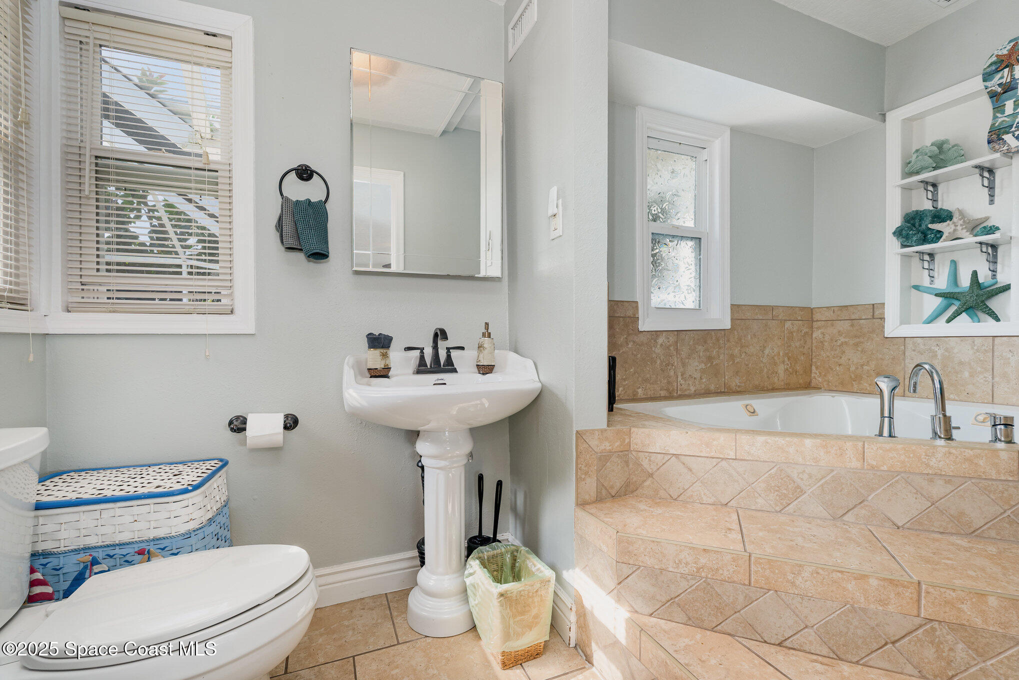 1304 Lichty Street Palm Bay, FL 32905 - Photo 26 of 63 a bathroom with a sink toilet and shower