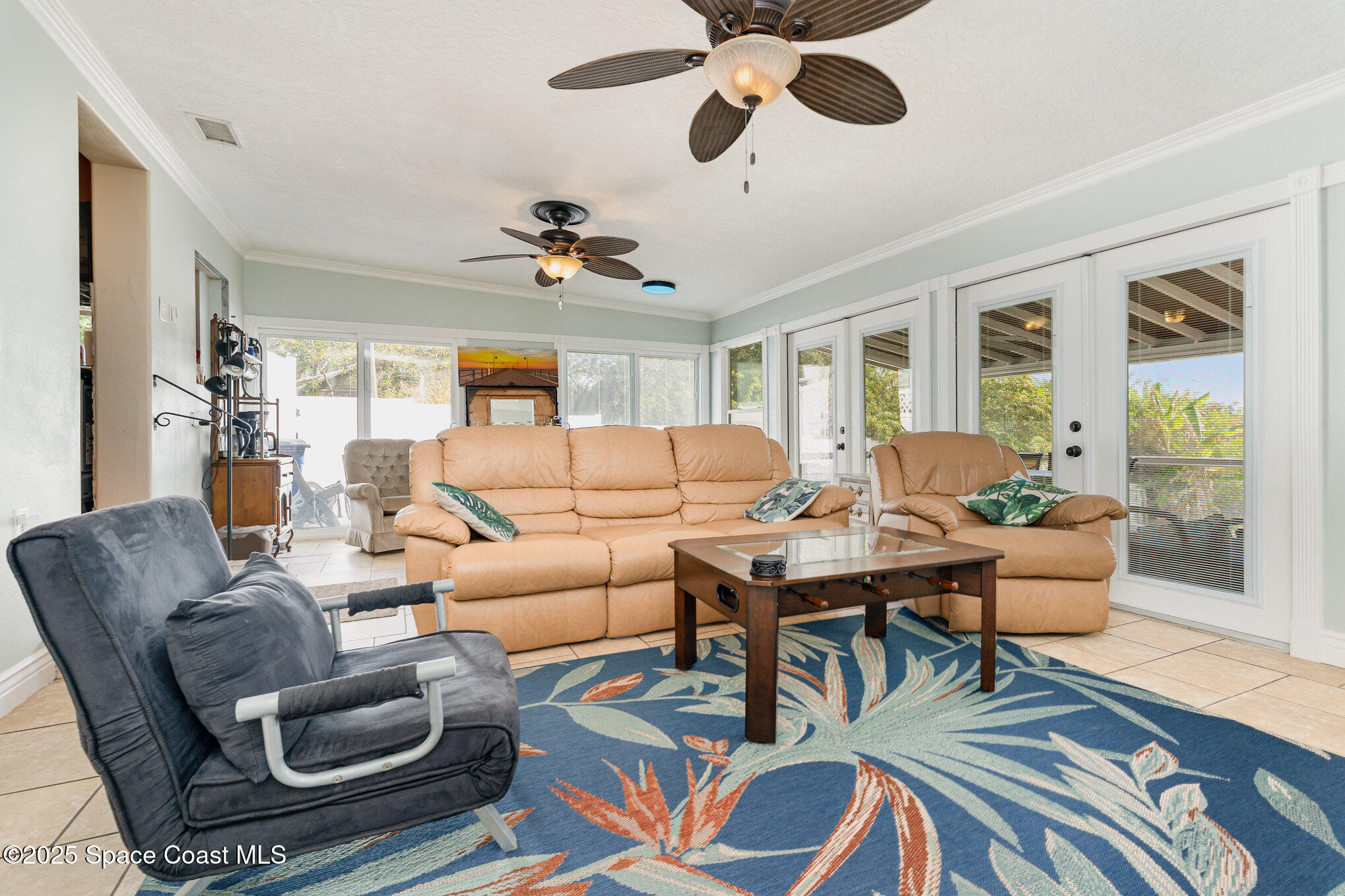 1304 Lichty Street Palm Bay, FL 32905 - Photo 28 of 63 a living room with furniture and a large window