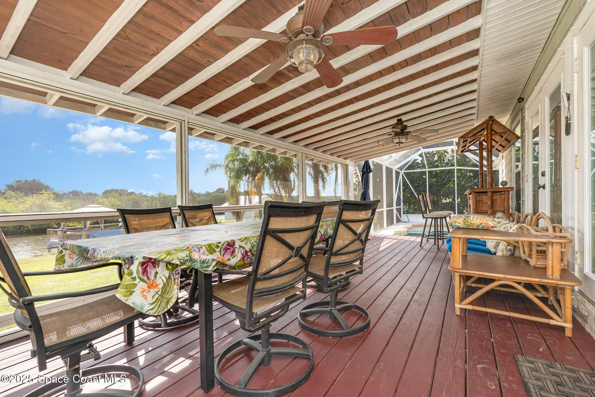 1304 Lichty Street Palm Bay, FL 32905 - Photo 29 of 63 a view of a chairs and table in the patio