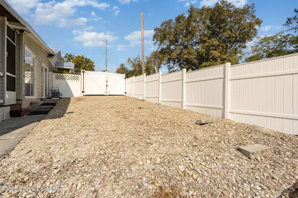 a childrens park with lots of swings and slides