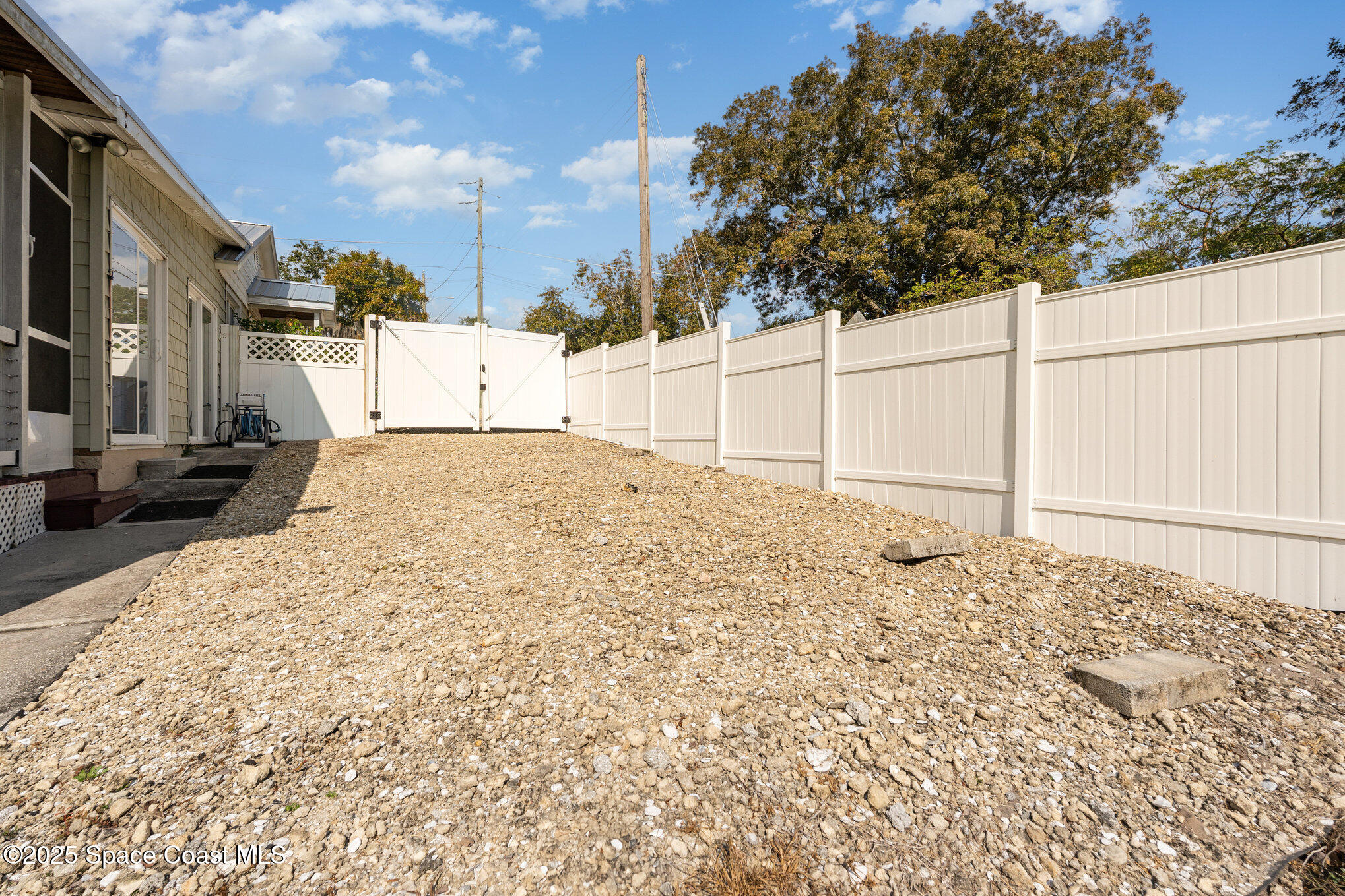 1304 Lichty Street Palm Bay, FL 32905 - Photo 37 of 63 a view of a backyard of the house