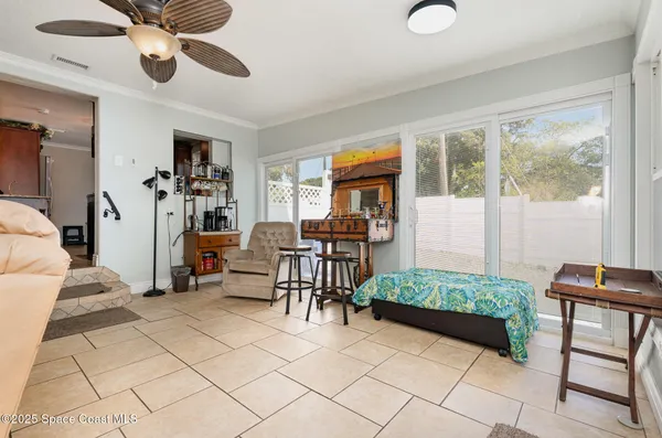 a living room with furniture and a window