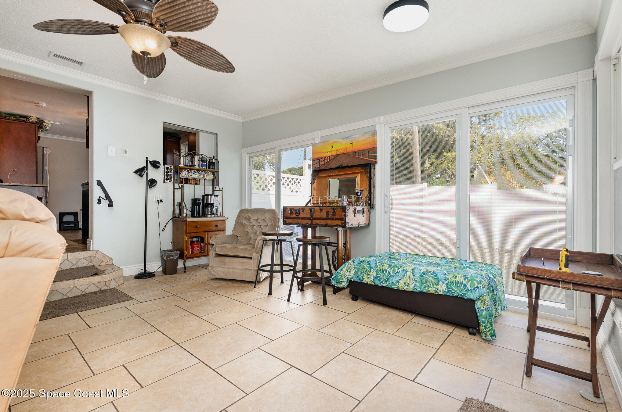1304 Lichty Street Palm Bay, FL 32905 - Photo 8 of 63 a living room with furniture and a window
