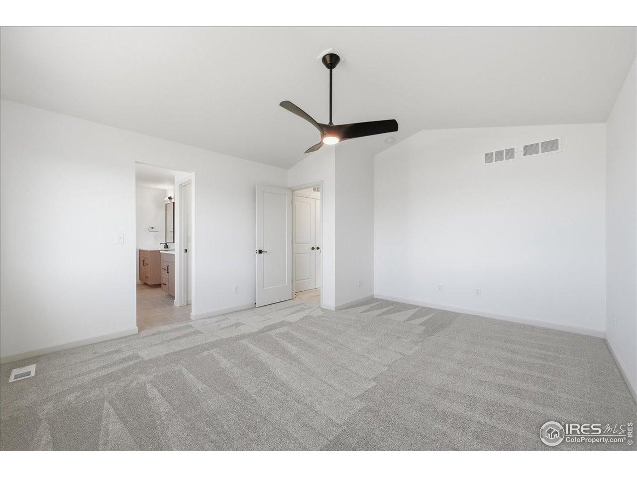 825 Doubleleaf Drive Windsor, CO 80550 - Photo 14 of 25 a view of empty room with ceiling fan