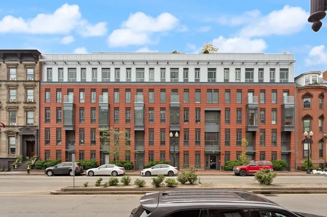 a front view of a building with street view