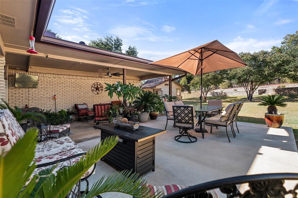 10517 Ravenswood Road Granbury, TX 76049 - Photo 28 of 35 an outdoor space with patio furniture